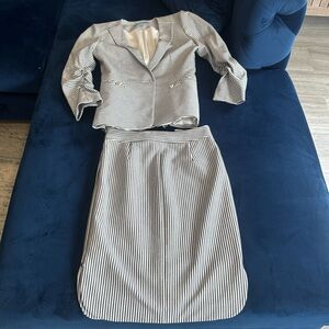 Professional Antonio Melani jacket and skirt.